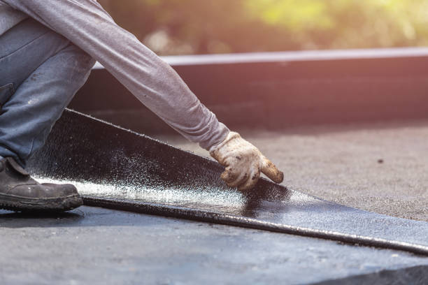 Professional Exterior Waterproofing technician working in Henderson, NC